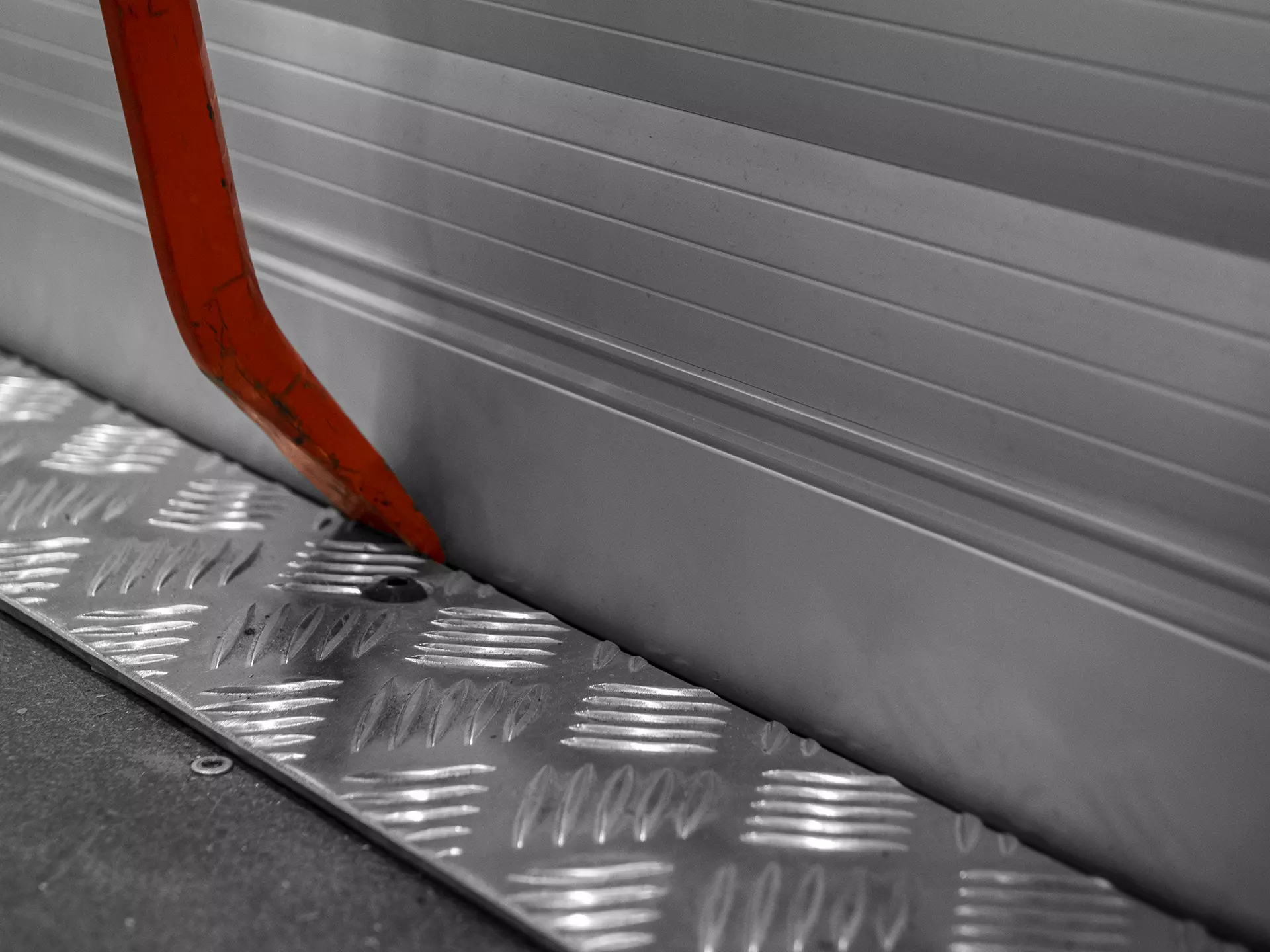 Pied de bîche essayant de forcer le store d'un Talos